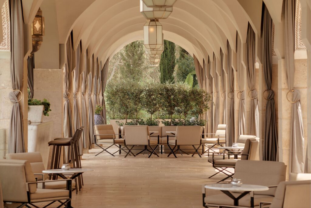 Arches frame a patio at Hotel Sahrai, a contemporary luxury hotel in Fes