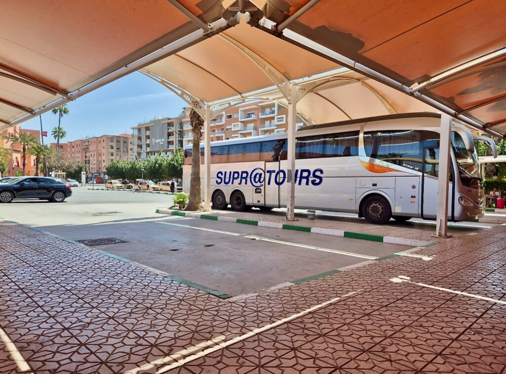 A Supratours bus parked at a station in Marrakech