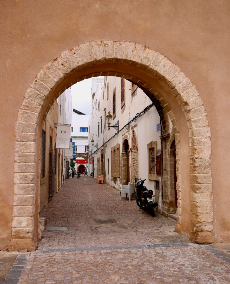Looking through an arch into the whitewashed Essaouira medina