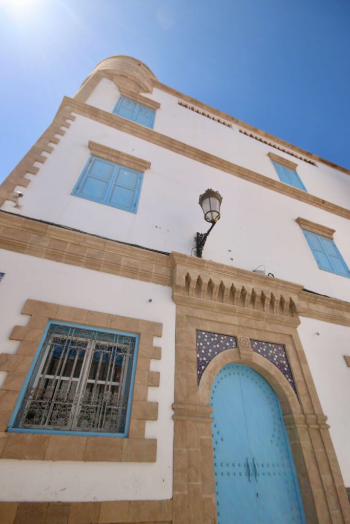 A blue and white building in Essaouira, which is best reached by bus when travelling around Morocco by public transport