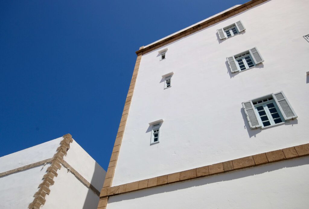 Whitewashed buildings in Essaouira - a popular destination for solo travellers in Morocco