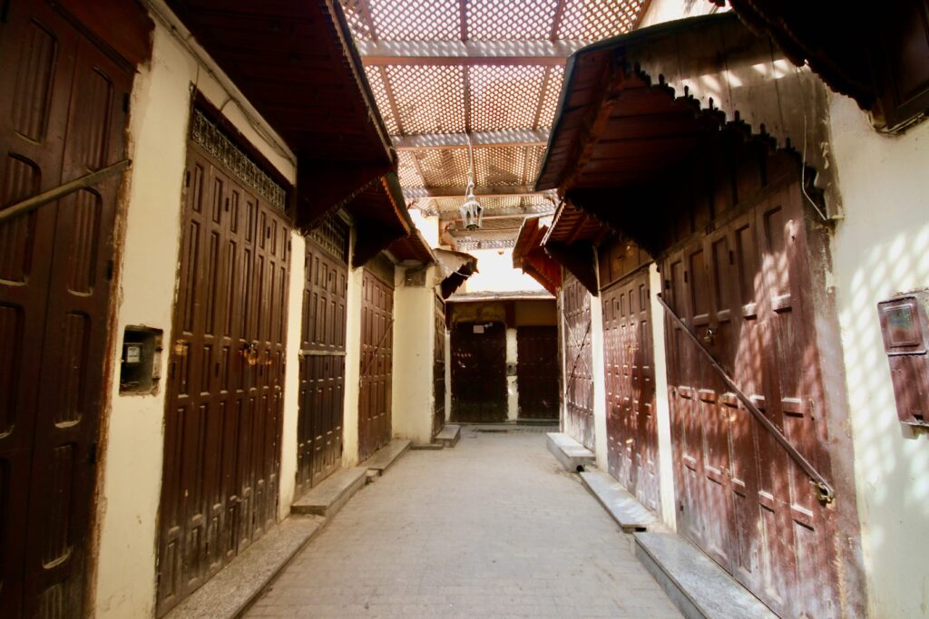 Is Morocco good for solo travelling?: Shuttered shopfronts in the medina of Fes