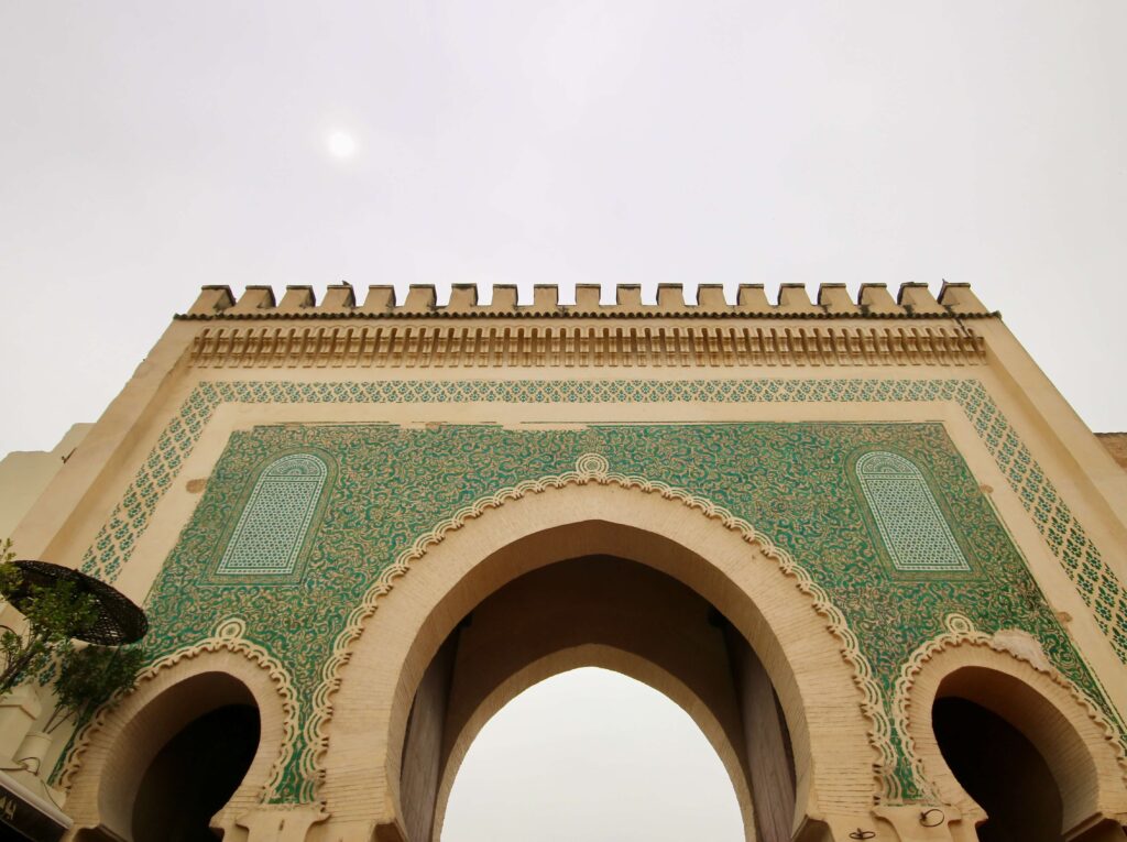 Solo traveller's guide to Fes: The green tiled facade of Bab Boujloud - one of the main gates to Fes el-Bali