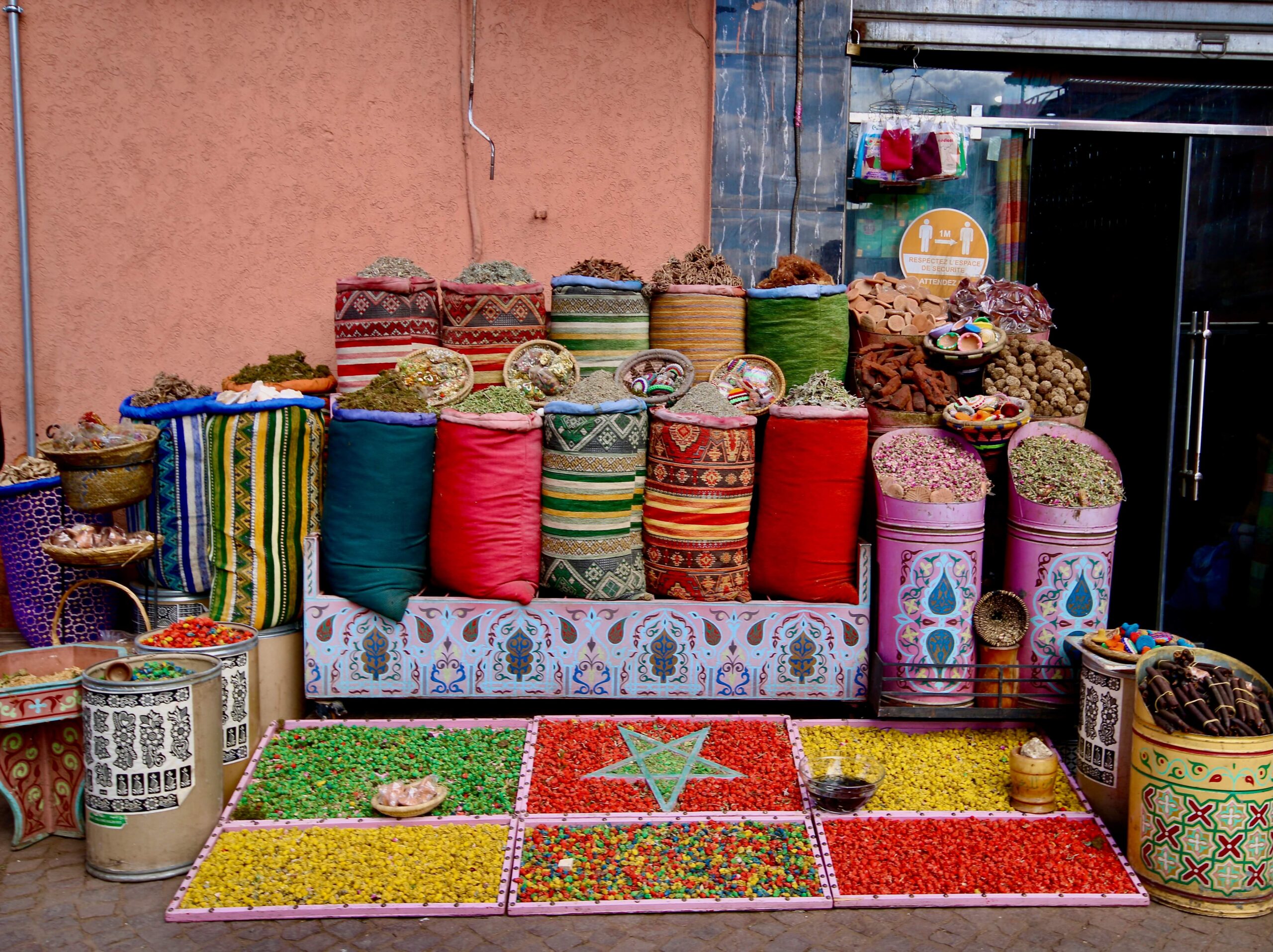 Colourful bags of spices for sale in the Marrakech medina