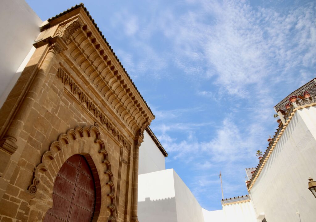 Best Moroccan cities for digital nomads: The entrance to a madrasa in whitewashed Salé