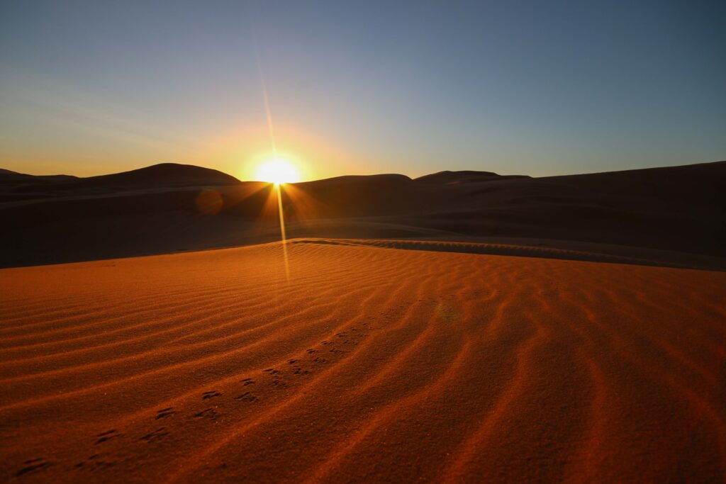 Sunrise over the Sahara Desert - a popular destination for solo travellers to Morocco