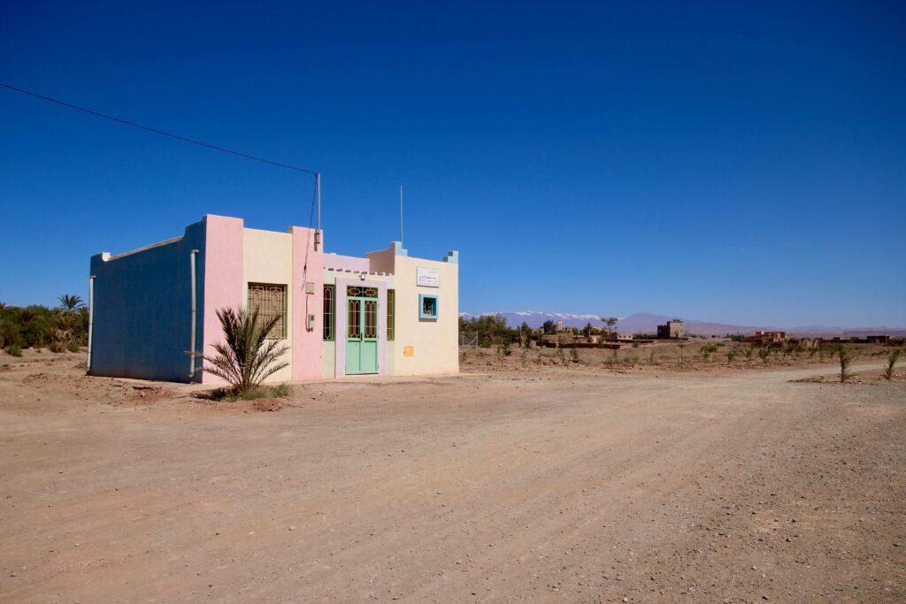 A colourful preschool building in Skoura, an off-the-beaten-path destination near Ouarzazate, Morocco