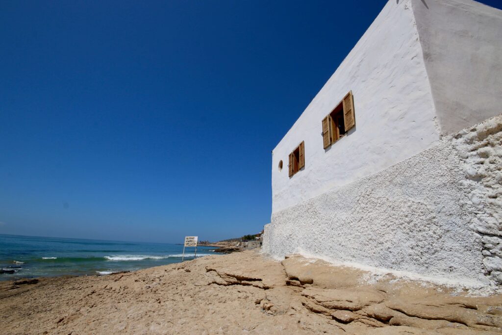 Is April a good time to visit Morocco? A whitewashed building on the coast near Agadir