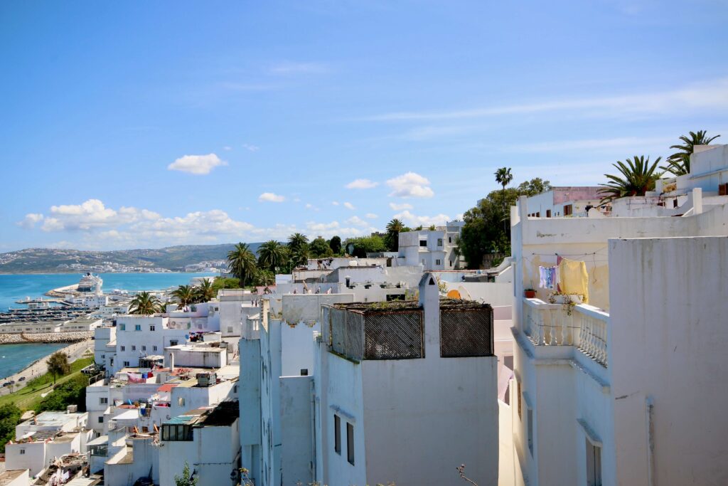 Whitewashed houses descend to the Strait of Gibraltar in Tangier, Morocco