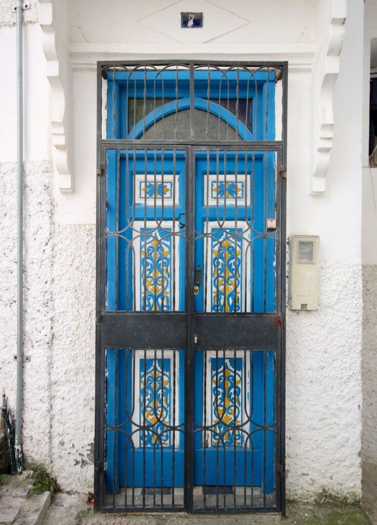 Moroccan dishes to try: A beautifully painted blue door in the Tangier medina