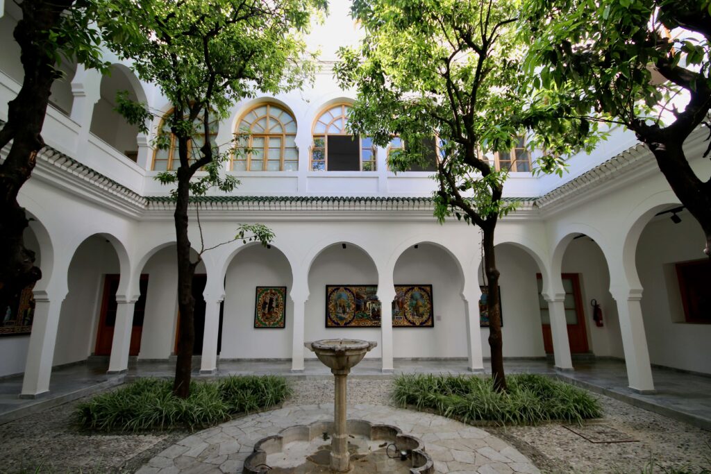 The leafy courtyard of Dar Niaba - a small art gallery and museum in Tangier