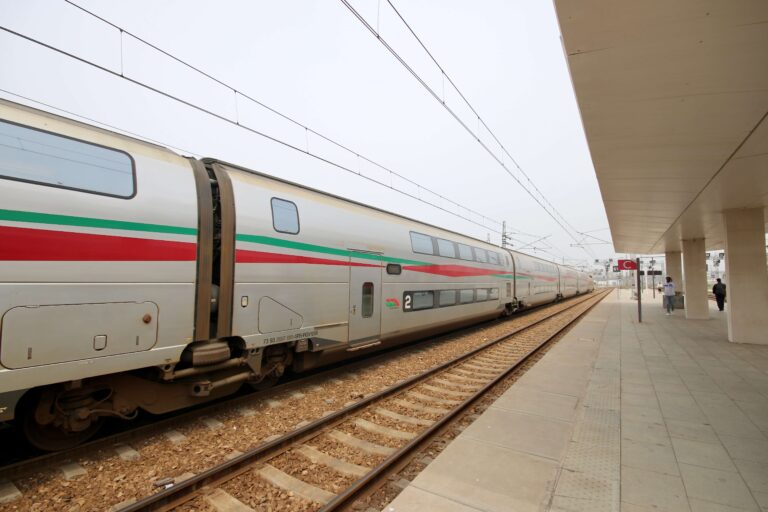 An ONCF train parked at a Moroccan railway station