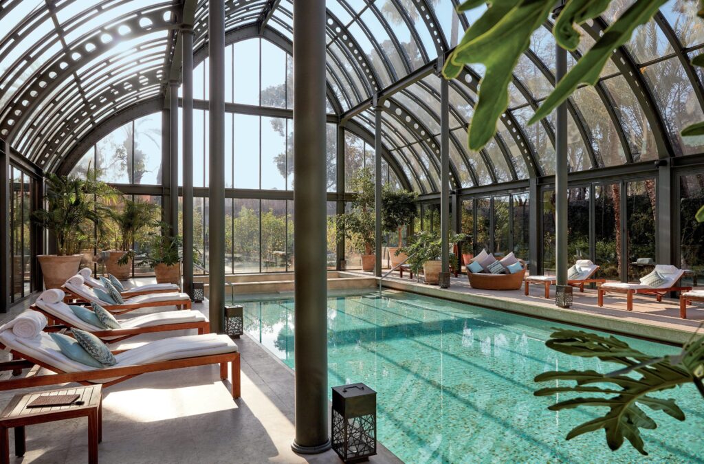 An atrium frames an indoor pool at the Royal Mansour - one of the most luxurious hotels in Marrakech