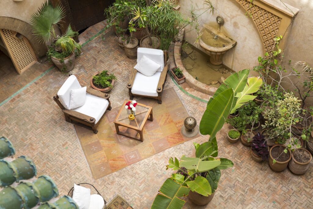 A bird's eye view of the central patio at Riad Chbanate - a mid-range hotel in Essaouira for solo travellers